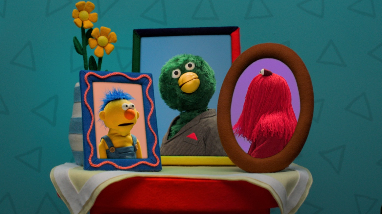 Don't Hug Me I'm Scared backdrop