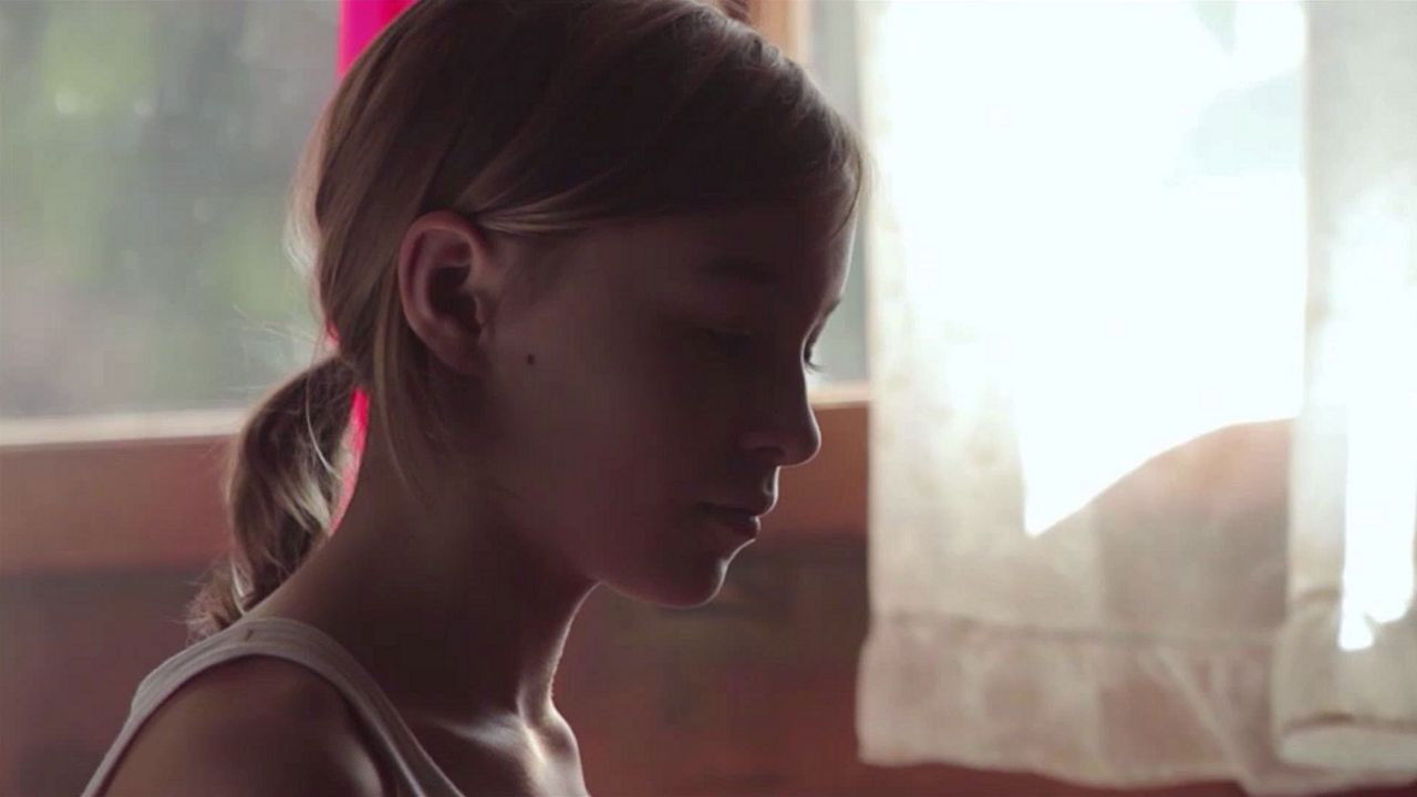 The Girls' Grave backdrop