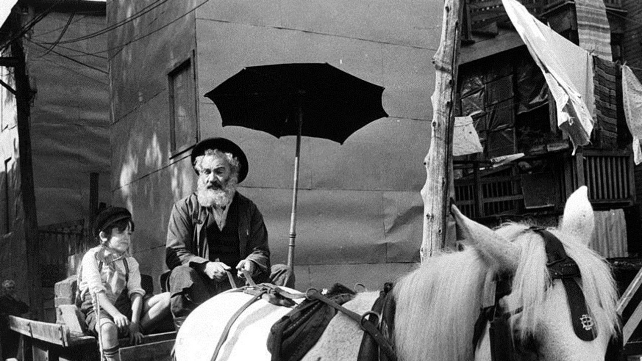 Lies My Father Told Me backdrop