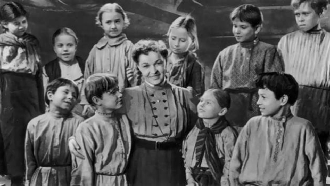 The Village Teacher backdrop