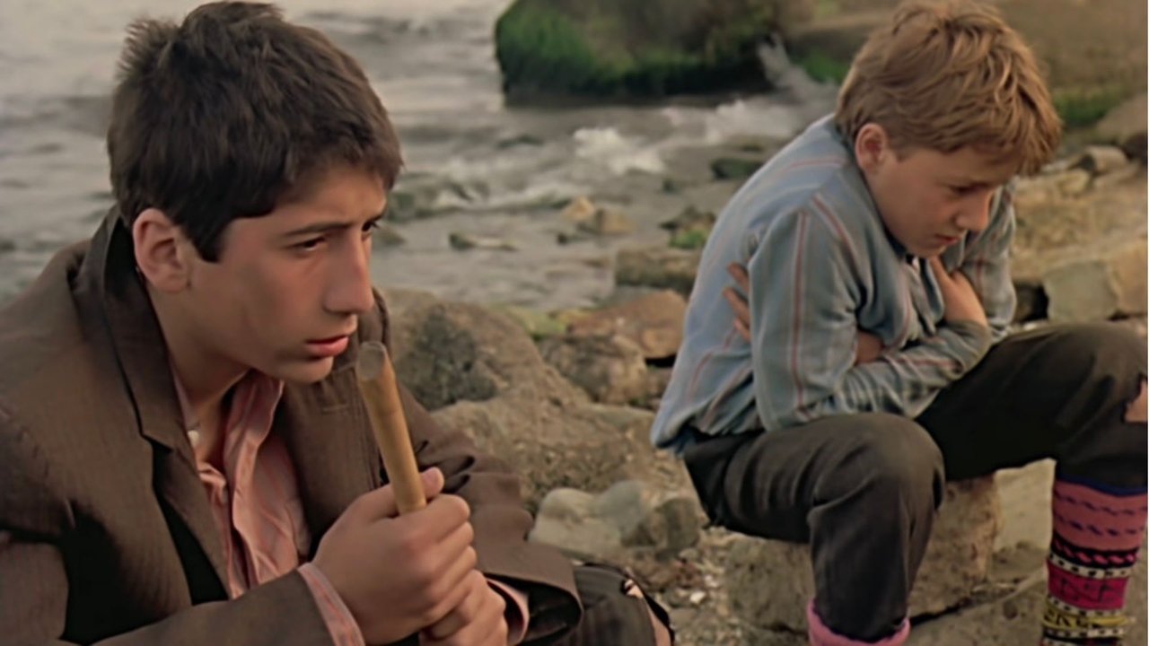 Yusuf and Kenan backdrop