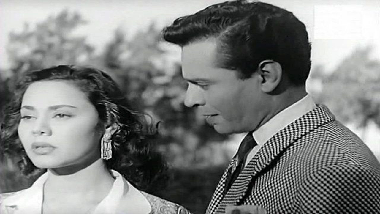 الميعاد backdrop