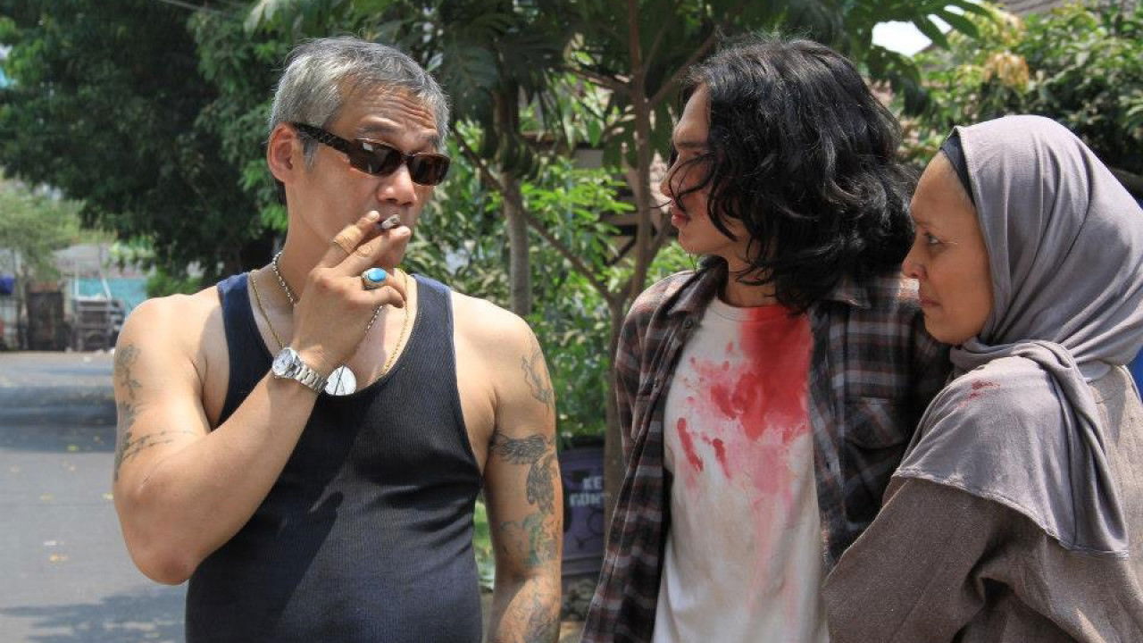 Sang Martir backdrop