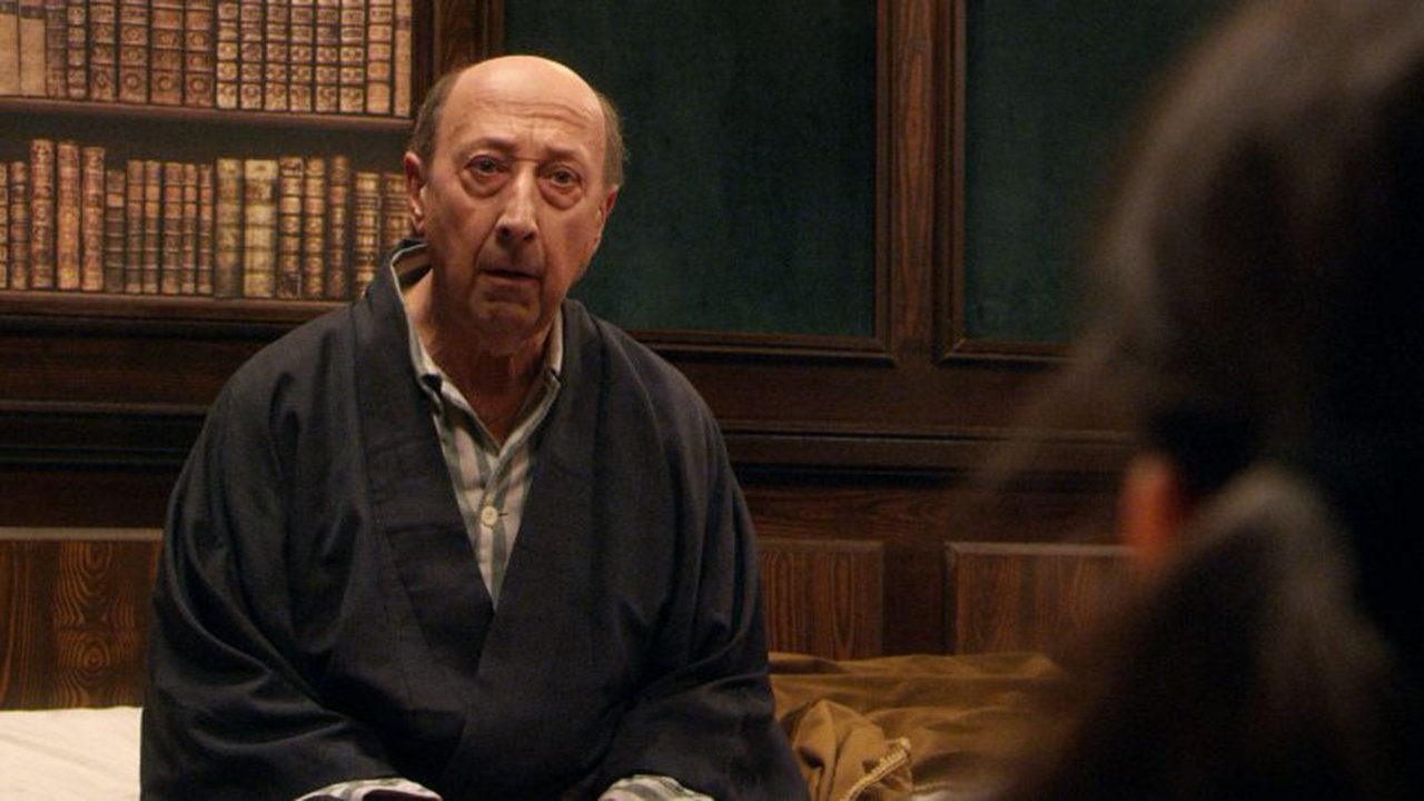 The Man Who Knew a Lot backdrop