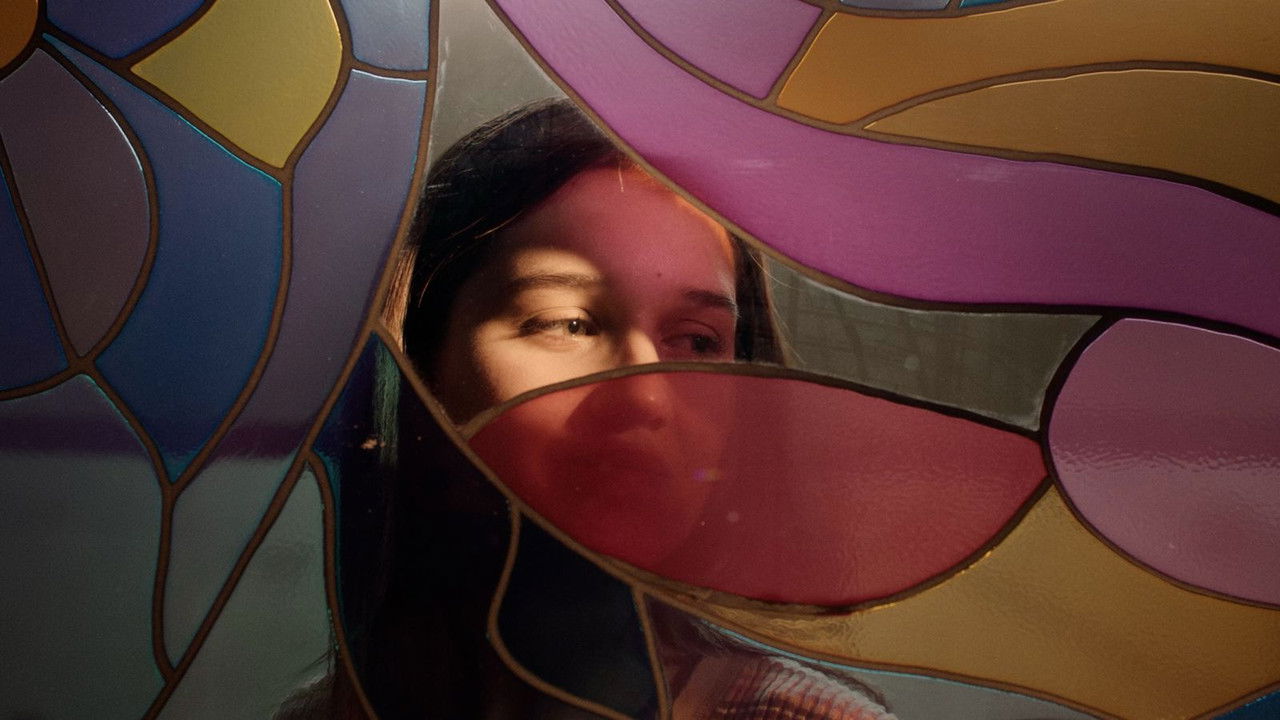 Cracks run through this multicolored glass backdrop