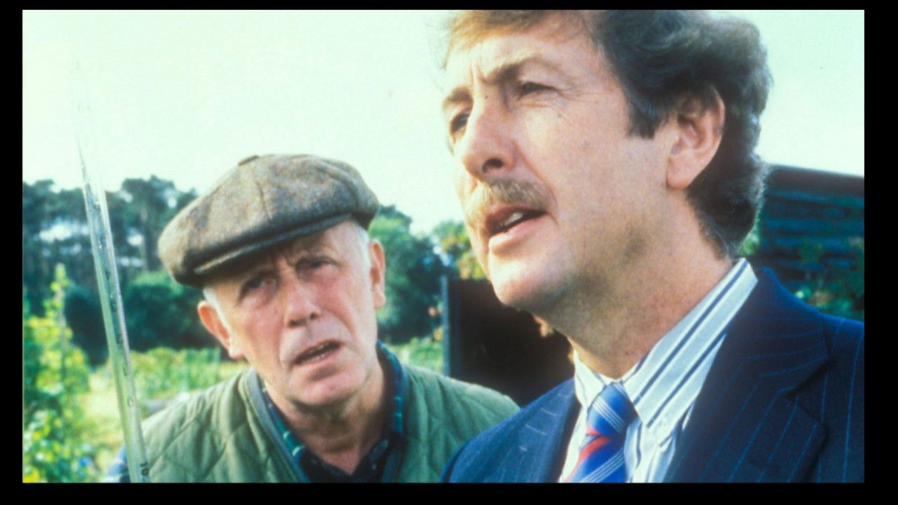 The Man In The Long Black Coat backdrop