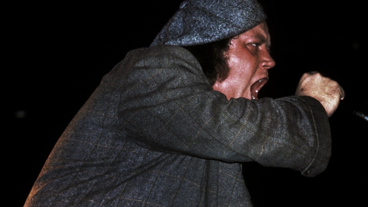 I Am Sam Kinison backdrop