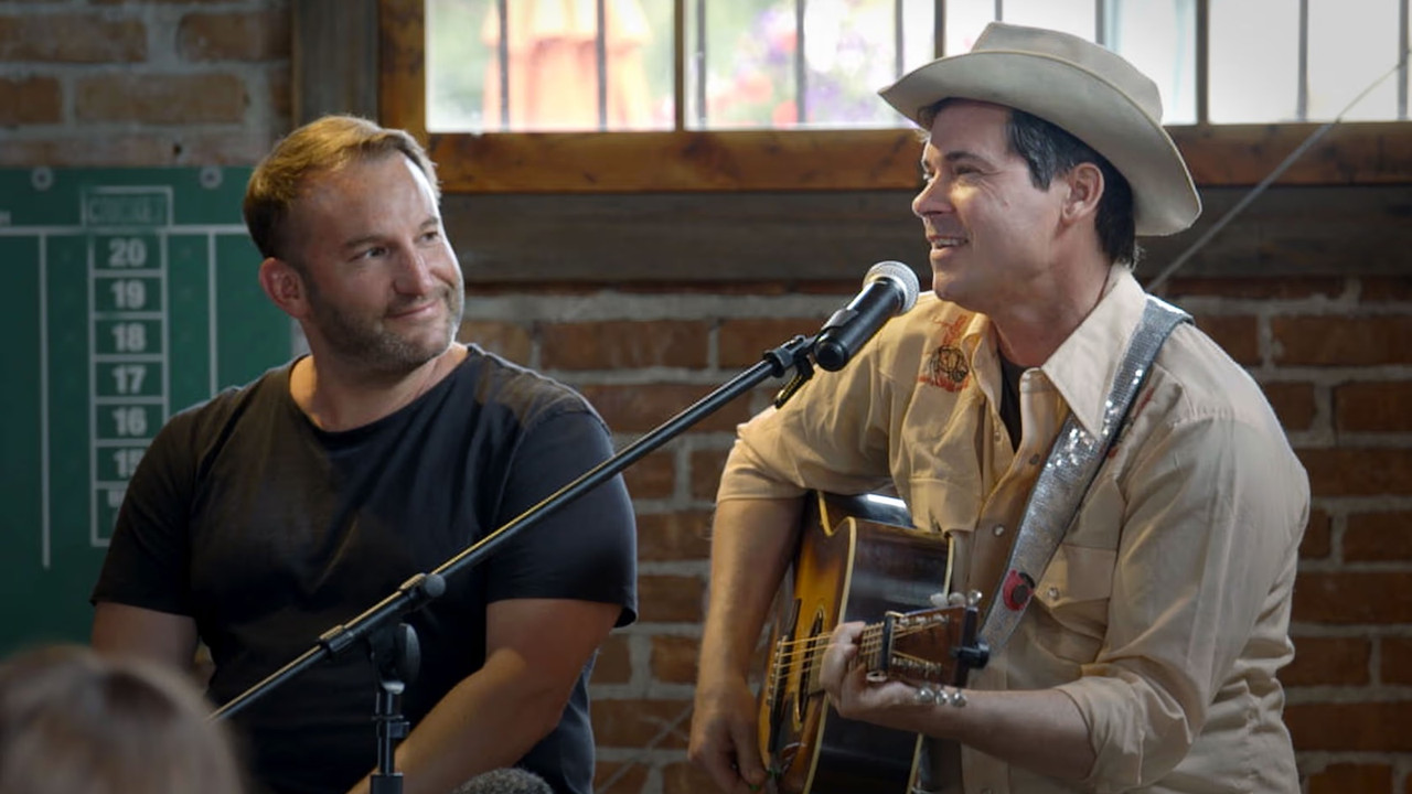 Louder Than Guns backdrop