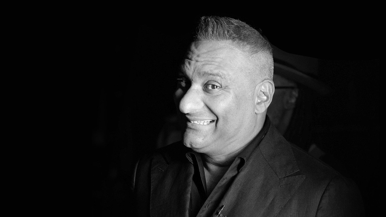 Russell Peters: Irresponsible Ensemble backdrop