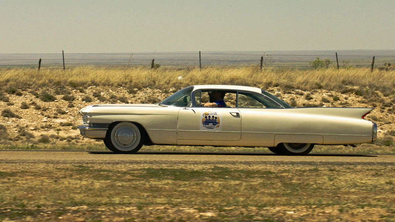 Úti að aka - Á reykspúandi kadilakk yfir Ameríku backdrop