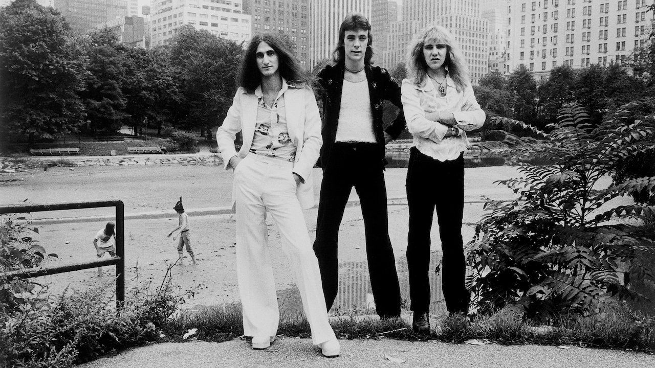 Rush: Beyond the Lighted Stage backdrop