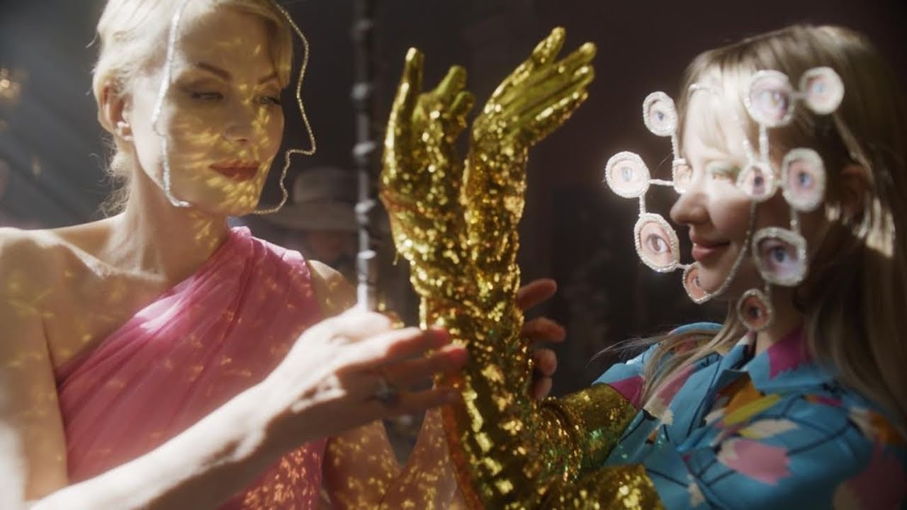 The Discreet Charm of the Magicians backdrop