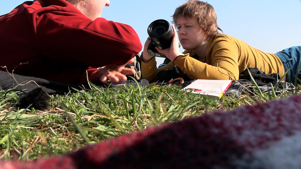 Becoming Roosi backdrop