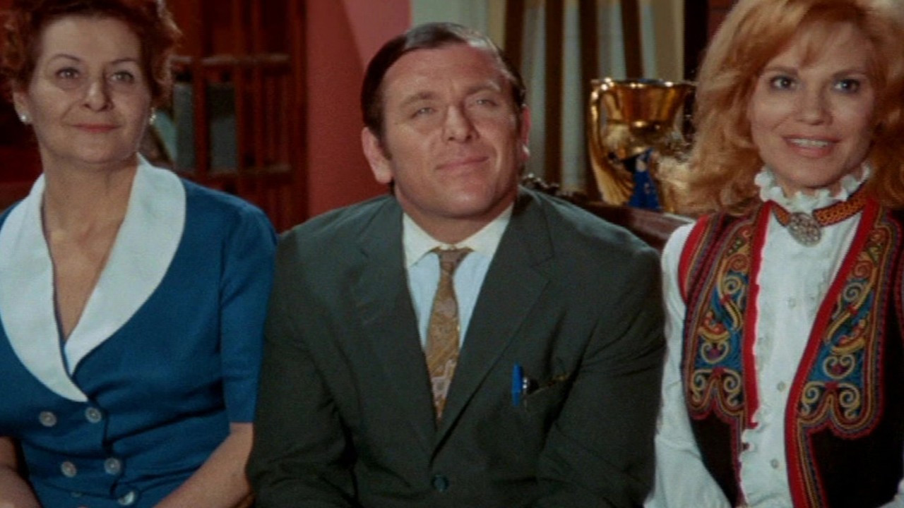 Volunteer in Eros backdrop