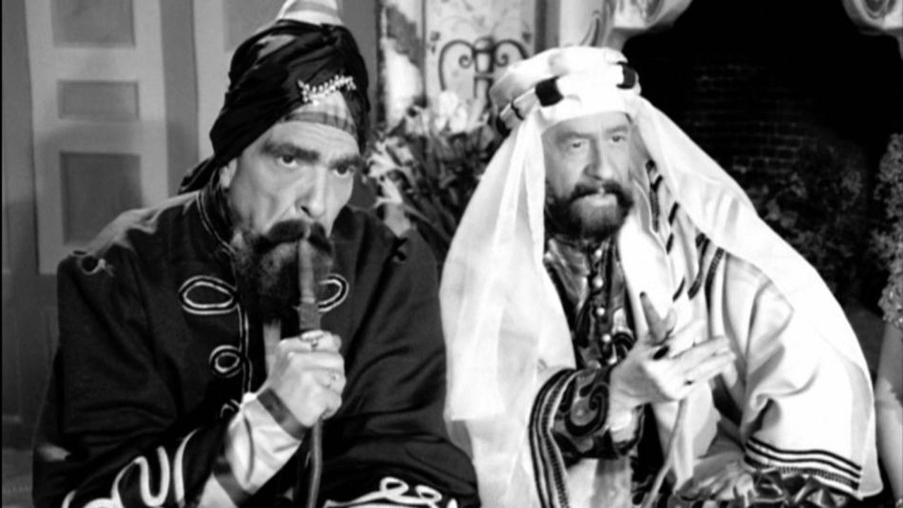 Ο Εμίρης και ο κακομοίρης backdrop