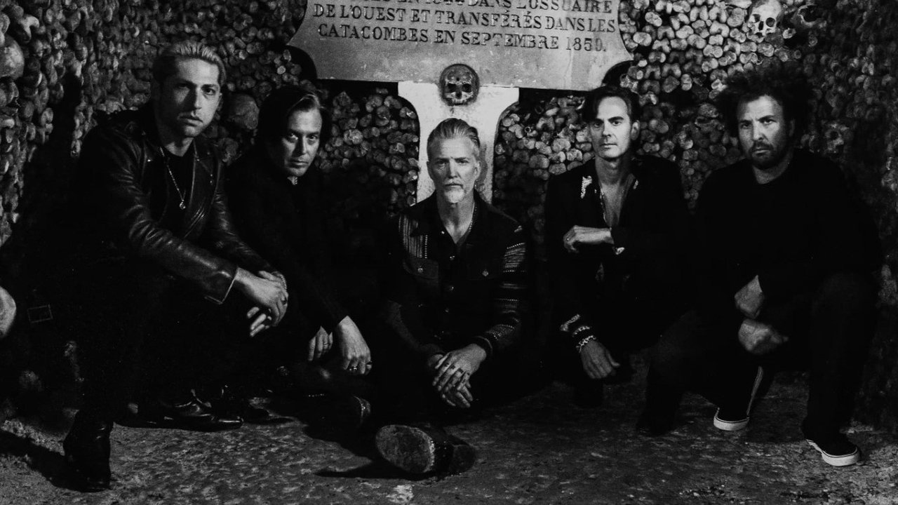 Queens of the Stone Age: Alive in Paris and Before backdrop