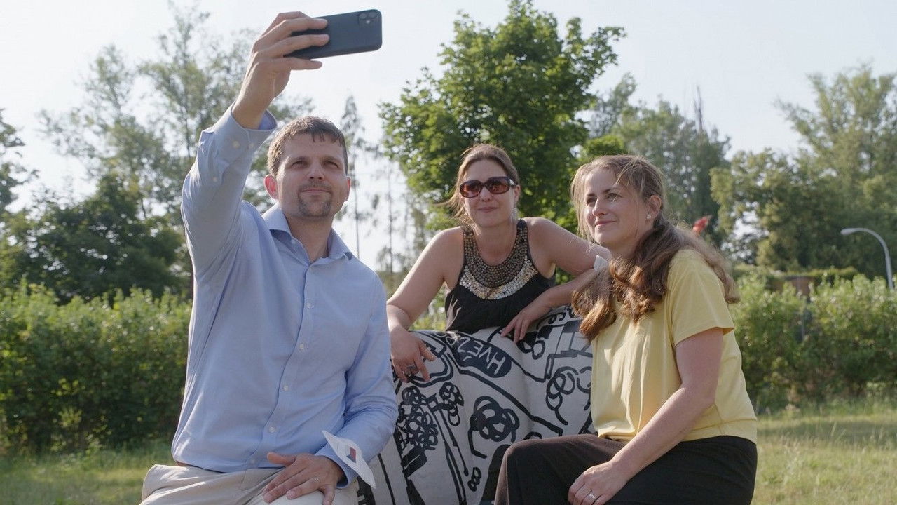 Komu patří město backdrop