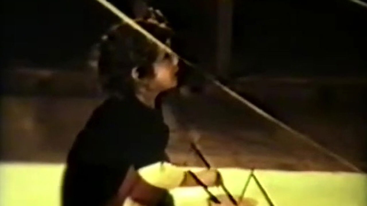 The Girl and Buda backdrop