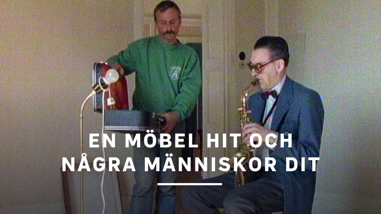 En möbel hit och några människor dit backdrop