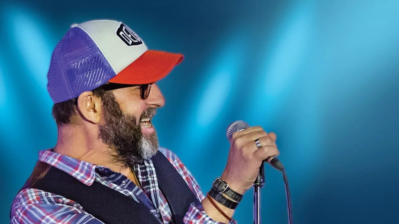 Kad Merad on Stage backdrop