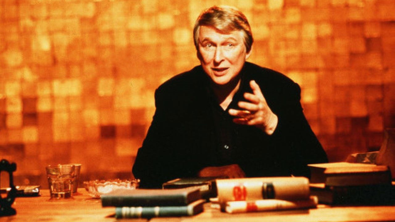 The Designated Mourner backdrop