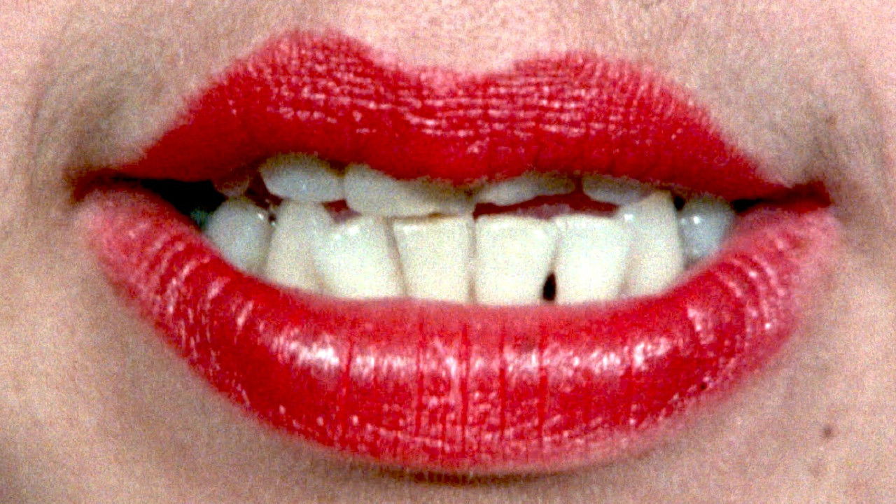 We Aim to Please backdrop