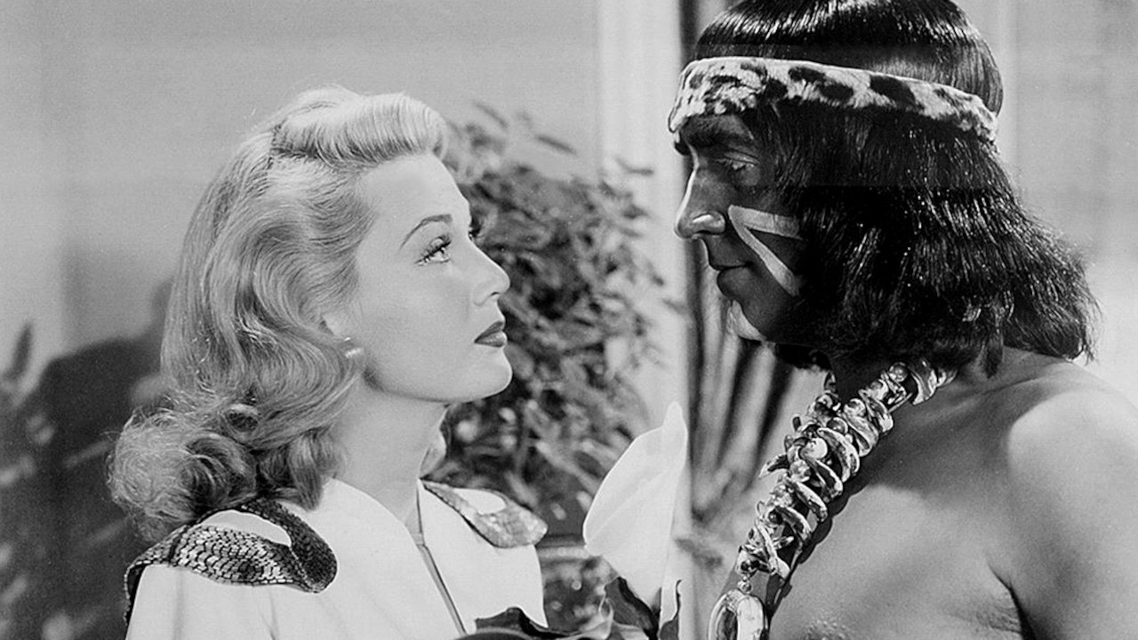 Her Primitive Man backdrop