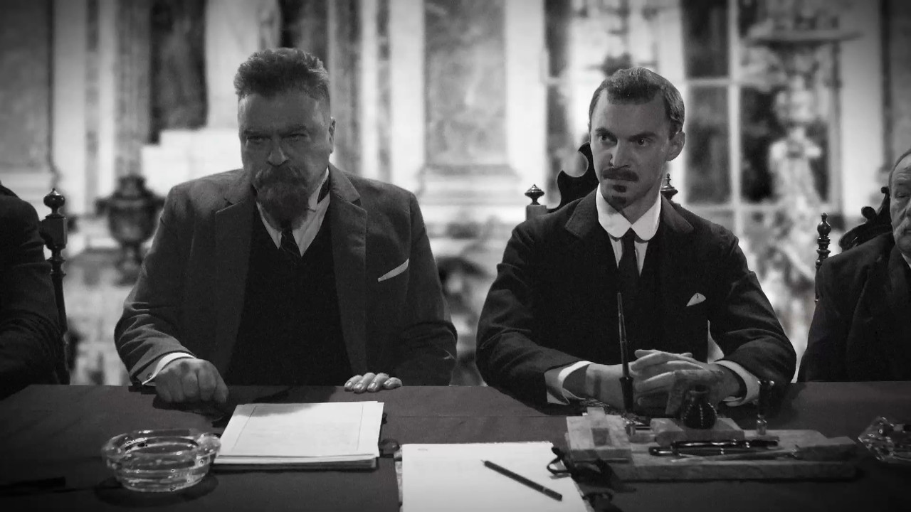 Dva muži v roce jedna backdrop