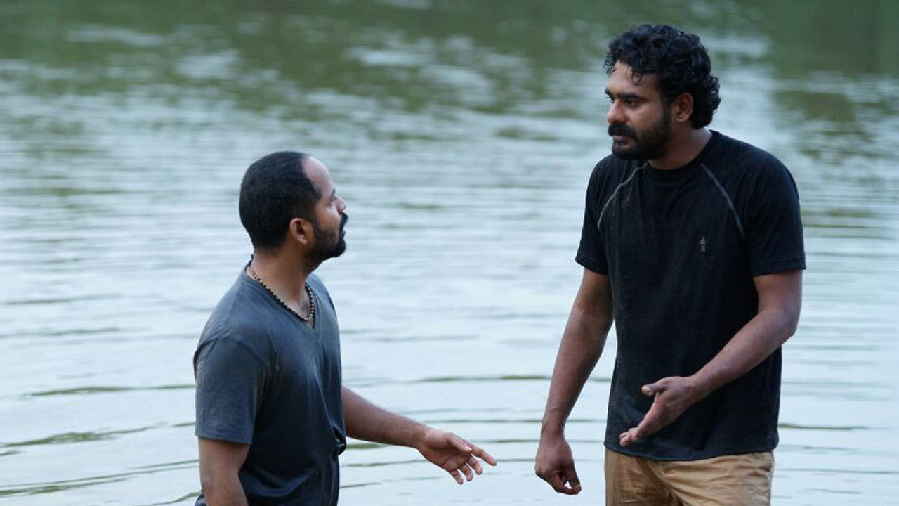 Njan Ninnodu Koodeyundu backdrop