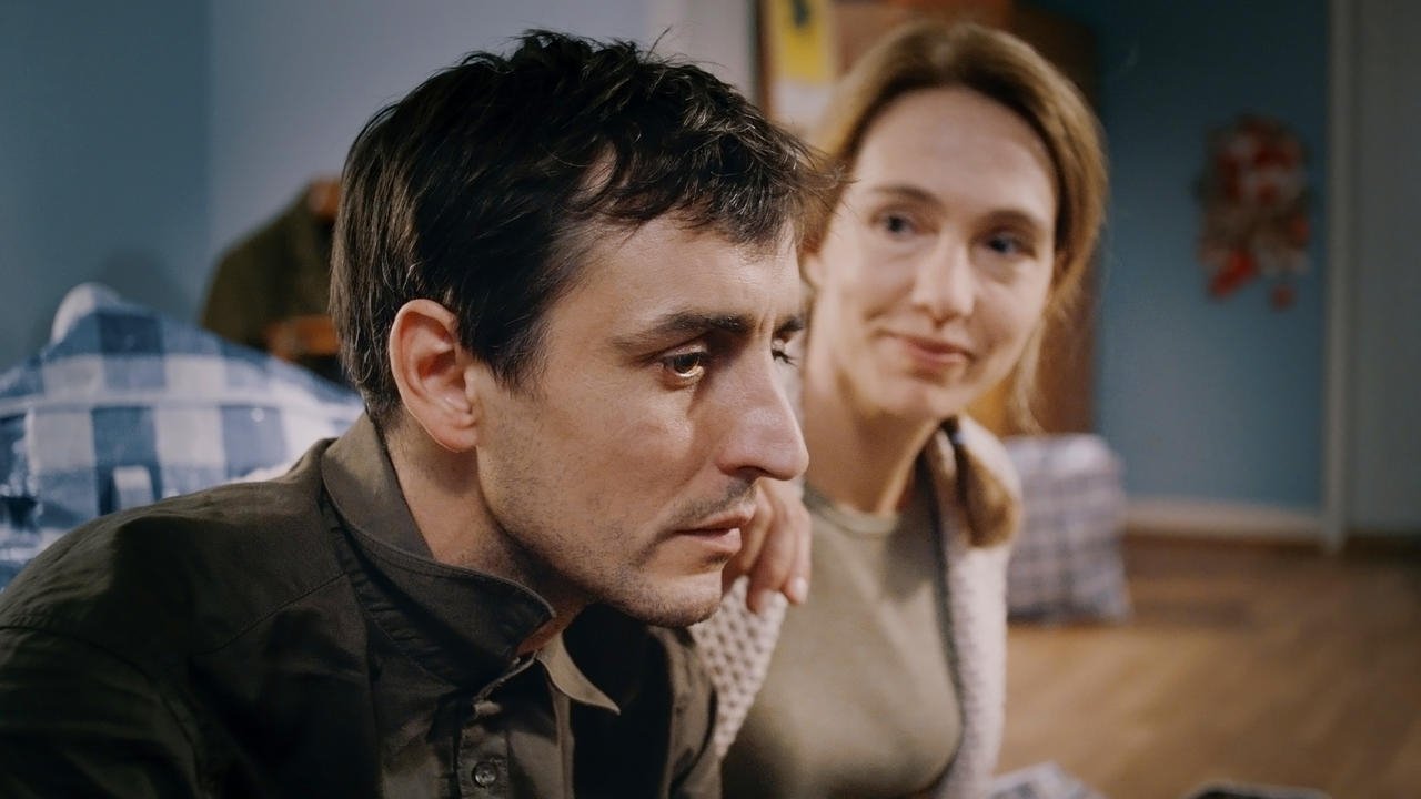 What's Between Us backdrop