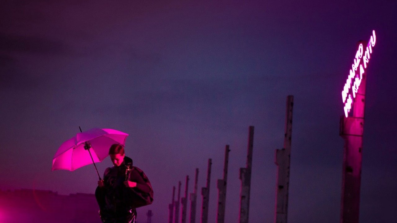 Under Electric Clouds backdrop