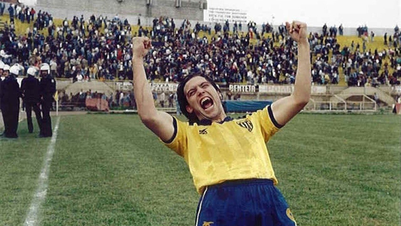 The Striker with Number 9 backdrop