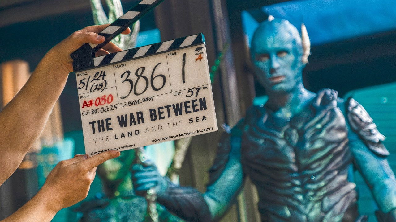 Deep Dive: The Making of The War Between The Land And The Sea backdrop