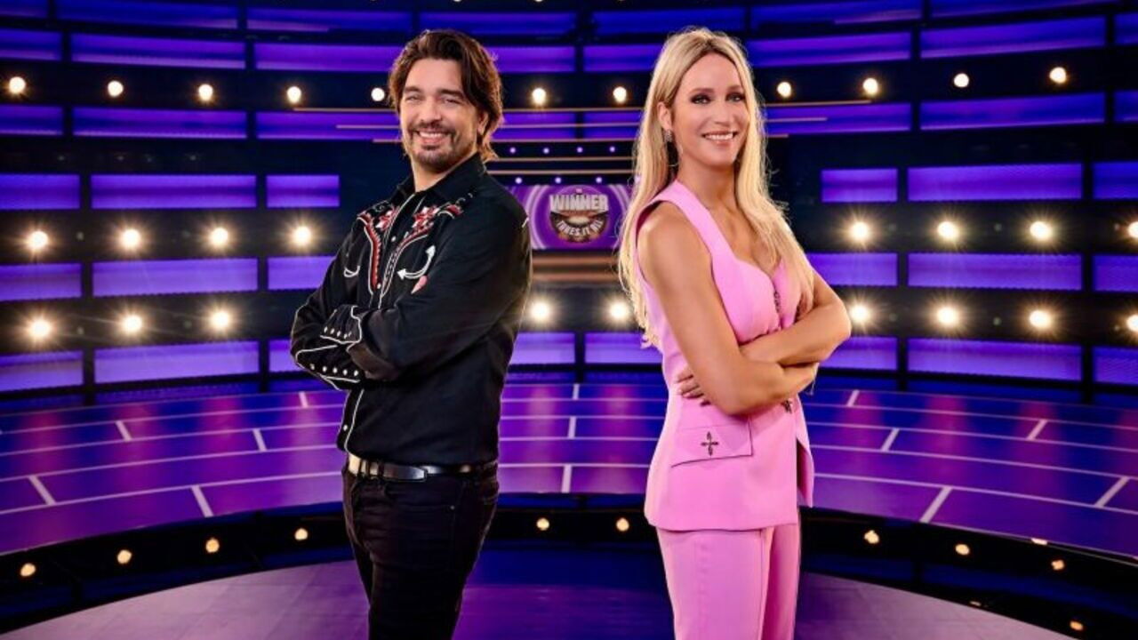 The Winner Takes It All backdrop