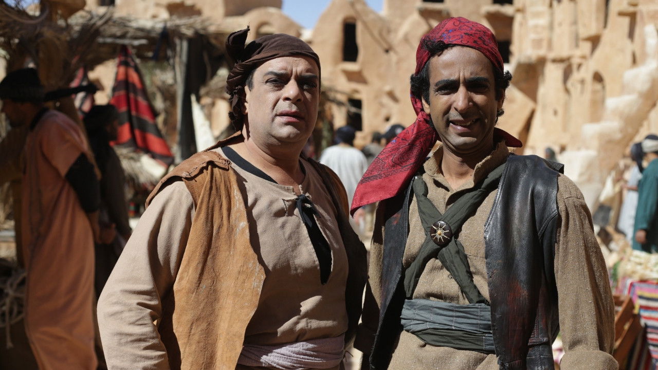 طفاش والأربعين حرامي backdrop