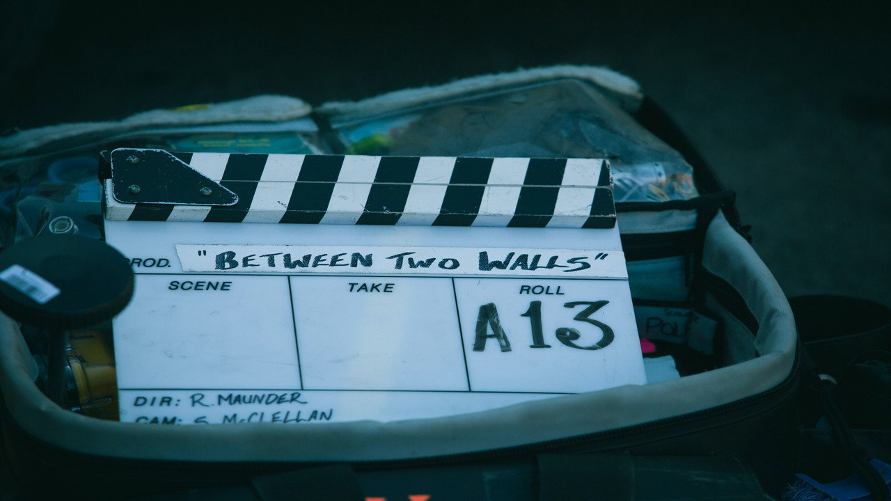 Between Two Walls backdrop