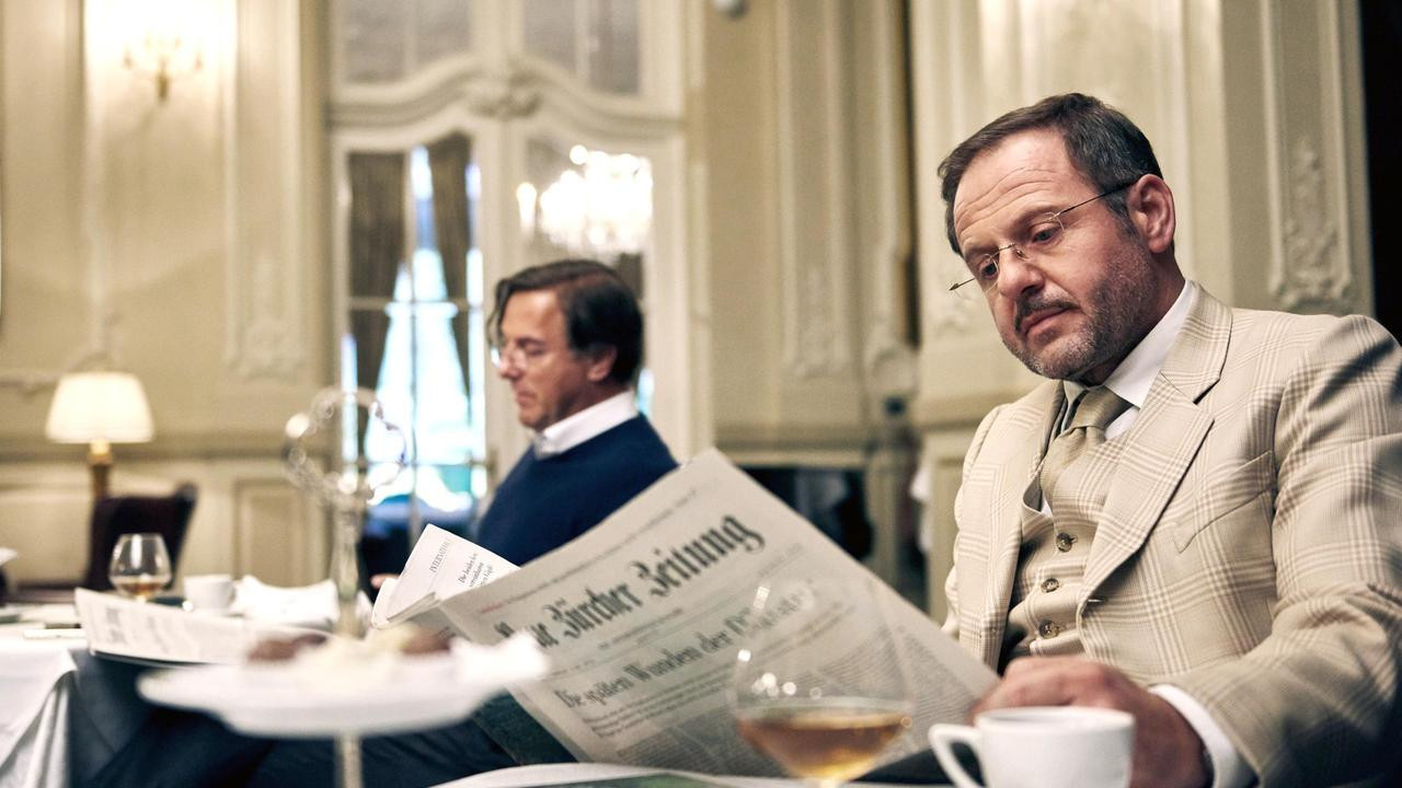 Allmen and the Mystery of the Dahlias backdrop