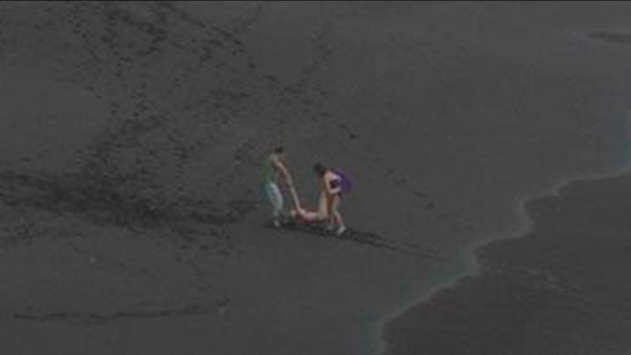 Three on the beach backdrop