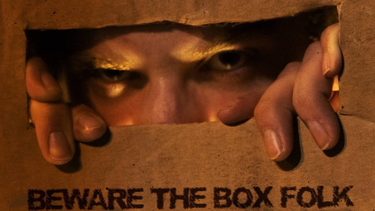 Beware the Box Folk backdrop