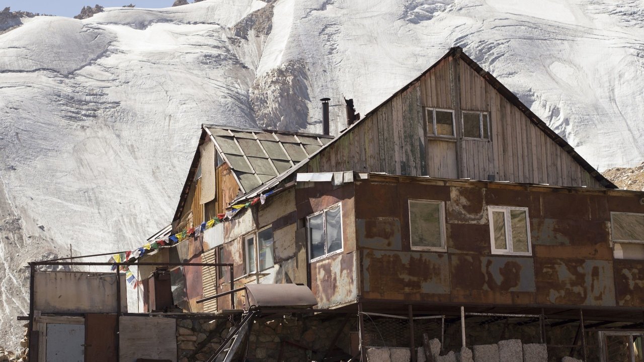 Woman and the Glacier backdrop
