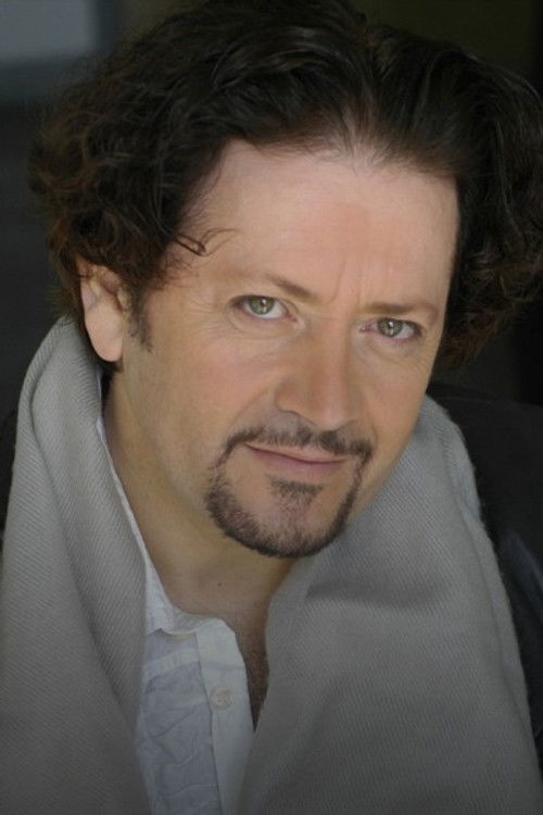 Frederik Ndoci as Juli
