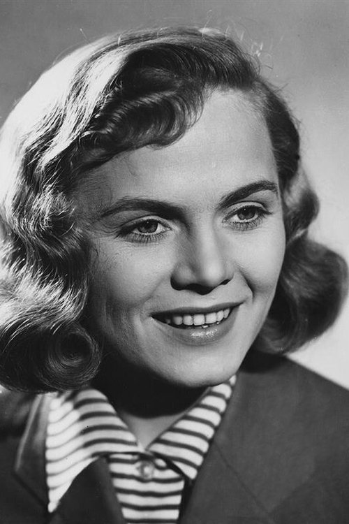 Ludmila Vendlová as saleswoman Marta -Kout's daughter