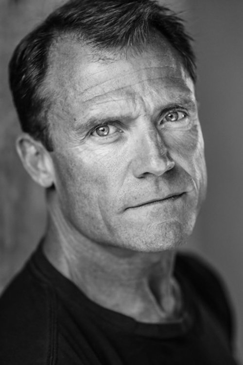 Shawn C. Orr as Interrogator