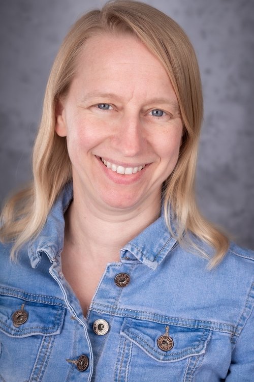 May Weller as Cafe worker