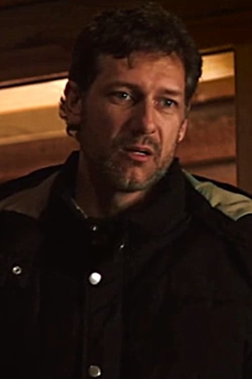 John Scuderi as the Stranger