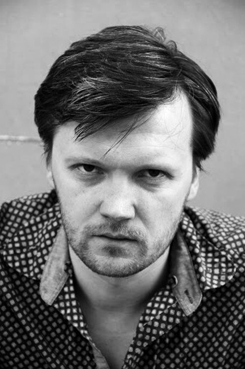 Aigars Apinis as Character Voice (voice)