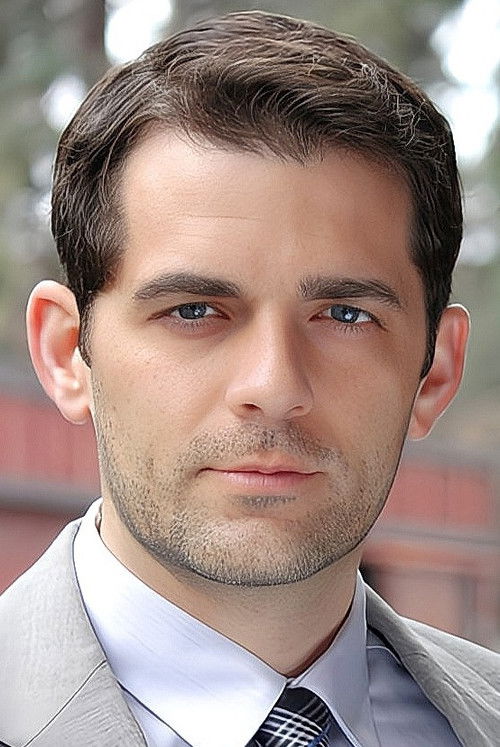 Derek Johnson as Photographer #2