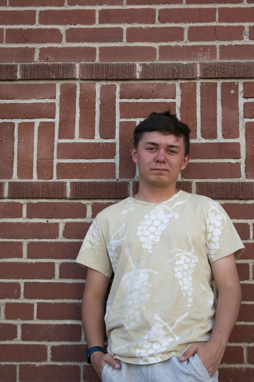 Evan Lake as The Passerby