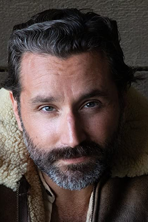 Garrett Marchbank as Frank