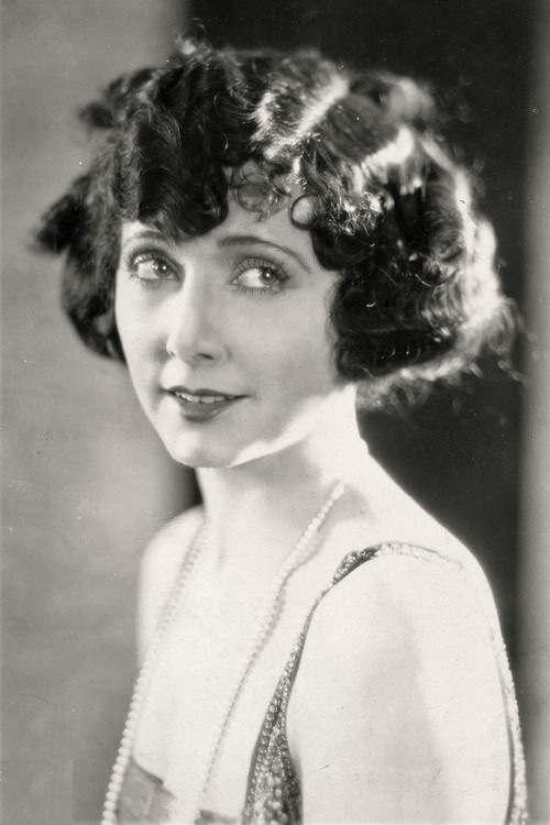 Mae Busch as Miss Jenkins